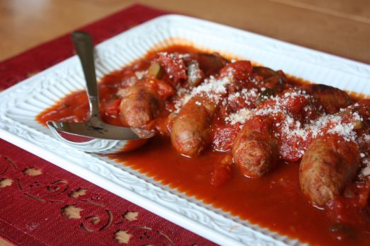 Veggie tomato sauce with chicken sausage on a platter